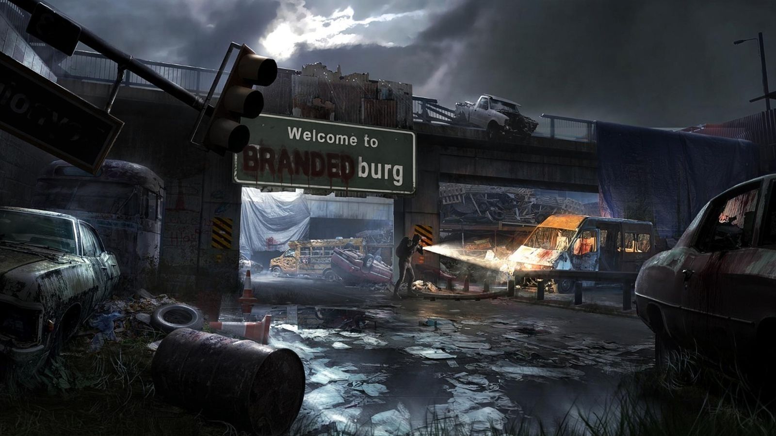 A highway overpass under a storm sky. The sign reads “Welcome to Brandenburg,” the name defaced in red to read “Branded.” A survivor with a flashlight searches the wrecks beneath it.
